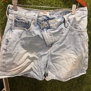 Forever 21 Blue Jean Shorts A symmetrical button